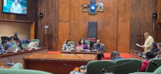 Honourable Minister Dr. E.T. Gina engages with Senate Portfolio Committee members during the presentation of MEPD’s 2025/26 annual performance report. Photo by MEPD
