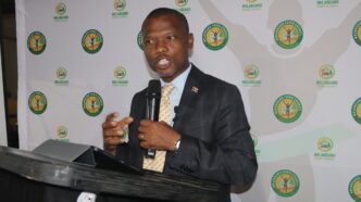 The Honourable Minister of Housing and Urban Development, Appolo Maphalala, addresses guests at the launch of the Nhlangano Town Council Marathon 2026 at Shingili Plaas Restaurant.