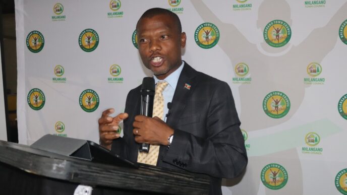 The Honourable Minister of Housing and Urban Development, Appolo Maphalala, addresses guests at the launch of the Nhlangano Town Council Marathon 2026 at Shingili Plaas Restaurant.