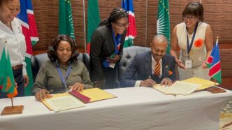Commissioner Sam Shivute and Zambia’s Permanent Secretary in the Ministry of Finance and National Planning, Ms Mwaka Mukubesa, sign key agreements formalising the operationalisation of the One Stop Border Post at Katima Mulilo. Photo by Namibia Revenue Agency NamRA.