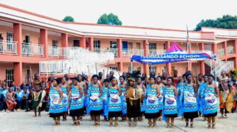 The school choir blending their choral tunes with culture & traditional dance. photo by HMCS