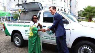 Honourable Minister of Tourism and Environmental Affairs Jane Mkhonta-Simelane receives a refrigerant recovery vehicle from UNDP Resident Representative Henrik Franklin at UN House, Mbabane, with industry and government representatives in attendance. Photo by UNDP Eswatini