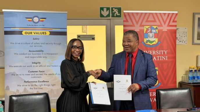 Ms. Andile Mtetwa-Amaeshi, ESWACAA Director General, and Prof. Justice Thwala, UNESWA Vice Chancellor, during the signing of the Memorandum of Agreement in Mbabane.