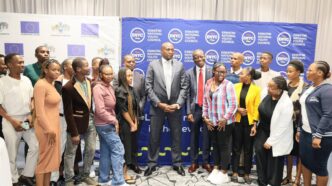 Prime Minister Russell Mmiso Dlamini and Minister of Sports, Culture & Youth Affairs Bongani Nzima pose with young people after the launch of the National Youth Development Coordination Framework in Mbabane.