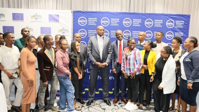 Prime Minister Russell Mmiso Dlamini and Minister of Sports, Culture & Youth Affairs Bongani Nzima pose with young people after the launch of the National Youth Development Coordination Framework in Mbabane.