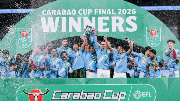 Manchester City players lift the Carabao Cup trophy in celebration after their triumph. Photo by X/@ManCity.