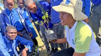 Zandisile Howe from the Eswatini Environment Authority guides students at Shewula High School during the Hlanyela Likusasa tree planting campaign.