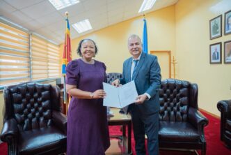 Honourable Minister of Foreign Affairs and International Cooperation Senator Pholile Shakantu receives Letters of Appointment from UNAIDS Country Director and Multi Country Representative Mr Alankar Malviya during a meeting in Mbabane