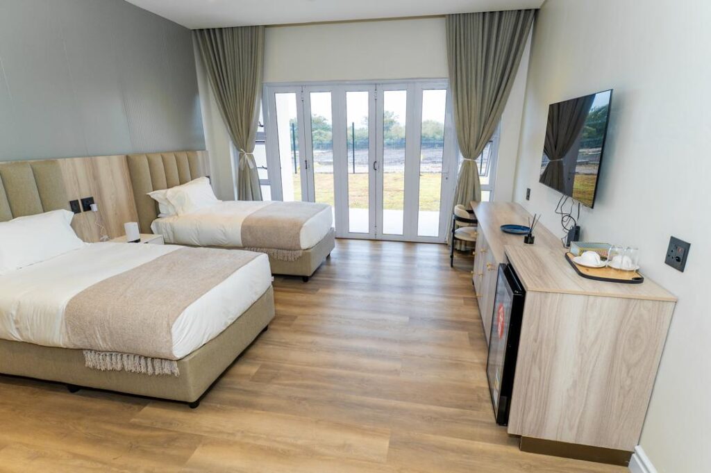 One of the elegantly finished rooms at Nsulutane Property Hotel in Hlane, offering a blend of modern comfort and serene natural surroundings for both business and leisure travellers.