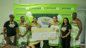 Partners display the E100 000 printed cheque for the Makoti Festival raffle draw during the announcement. Photo credit: Supplied.