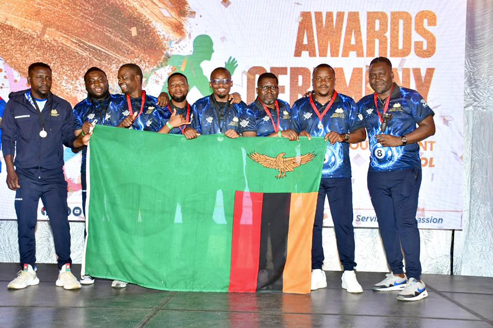 Zambian participants celebrate their overall and football victories at SAIRAG 2026, holding their trophies proudly. Photo by ZRA.