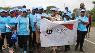 Tryphinah Mvubu, founder of Autism Eswatini, joins Deputy Prime Minister Thulisile Dladla during the Autism Awareness Month march