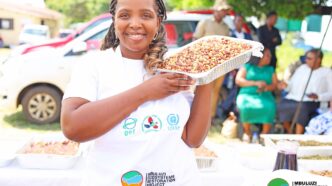 Community members prepare nutritious meals using indigenous crops at the Mbuluzi Ecosystems Restoration Project display in Mkhiweni Inkhundla.