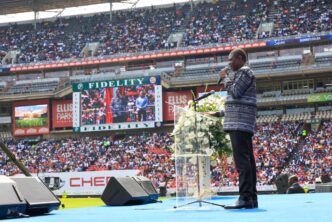 Deputy President Shipokosa Paul Mashatile addresses congregants during the Good Friday service at UCKG Ellis Park Stadium in Johannesburg.