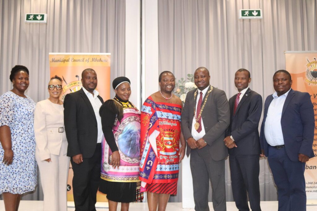 Minister Appolo Maphalala, municipal leaders and Tinkhundla representatives pose for a group photo after the signing of the governance MoU in Mbabane.
