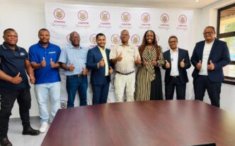 EIPA officials pose with management from Eswatini Beverages during a site visit