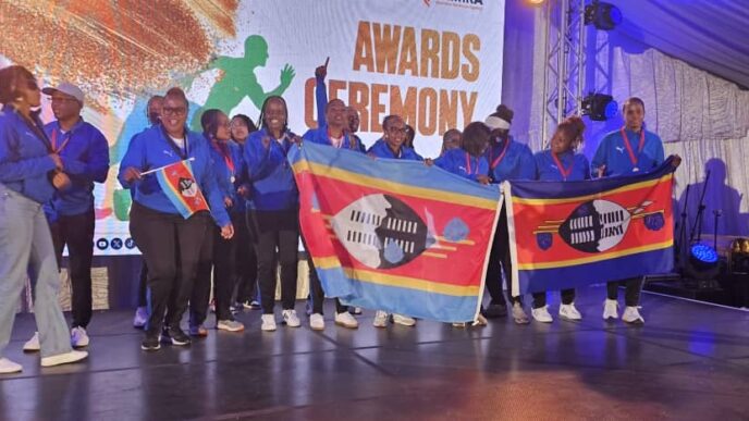 Eswatini Revenue Service athletes celebrate their medal haul in pool, table tennis, netball and chess during the SAIRAG 2026 awards ceremony in Swakopmund, Namibia. Photo by Eswatini Revenue Service.