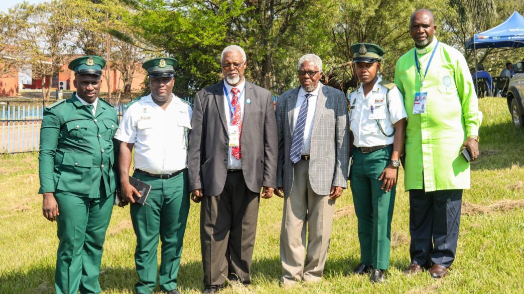 Chief Archbishop Professor Samson Hlatjwako who is the President of the League of African Churches (3rd L) together with senior church leaders pose with the team from His Majesty’s Correctional Services at Ludzidzini Royal Residence. Photo by HMCS