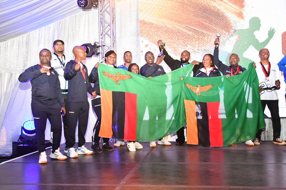Zambian participants celebrate their overall and football victories at SAIRAG 2026, holding their trophies proudly. Photo by ZRA.