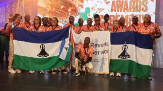 Team Lesotho celebrates their impressive medal haul at SAIRAG 2026, holding gold, silver, and bronze trophies won in individual and team events. Photo by RSL