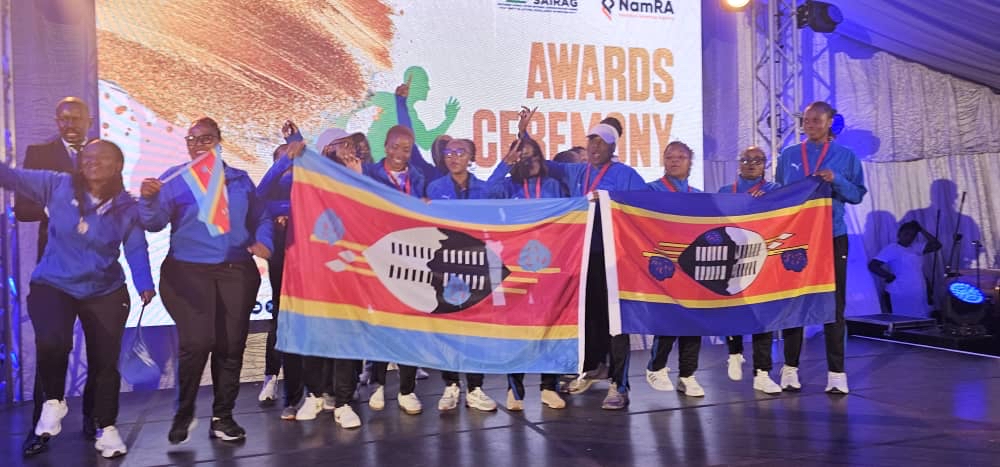Eswatini Revenue Service athletes celebrate their medal haul in pool, table tennis, netball and chess during the SAIRAG 2026 awards ceremony in Swakopmund, Namibia. Photo by Eswatini Revenue Service.