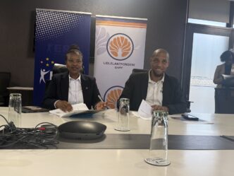 Futhi Tembe, CEO of ENPF (left), and Brightwell Nkambule, Commissioner General of ERS, signing the MoU in Ezulwini. Photo by ERS