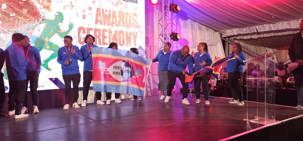 Eswatini Revenue Service athletes celebrate their medal haul in pool, table tennis, netball and chess during the SAIRAG 2026 awards ceremony in Swakopmund, Namibia. Photo by Eswatini Revenue Service.