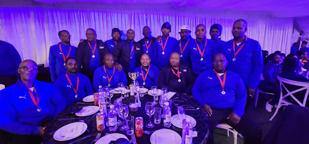 Eswatini Revenue Service athletes celebrate their medal haul in pool, table tennis, netball and chess during the SAIRAG 2026 awards ceremony in Swakopmund, Namibia. Photo by Eswatini Revenue Service.