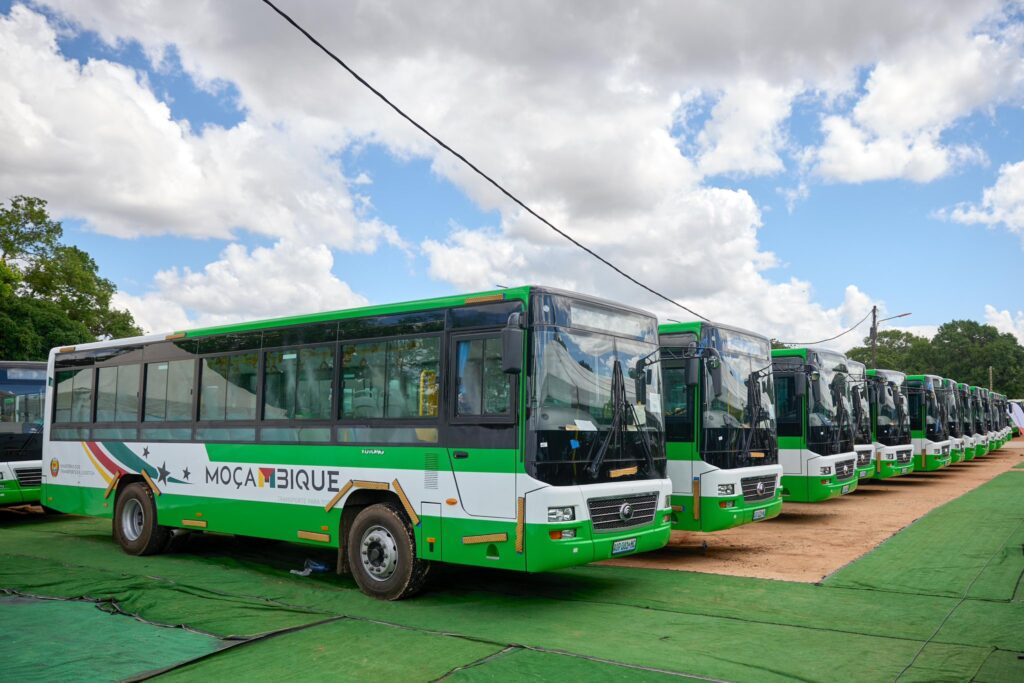 Part of the 100 newly delivered buses lined up in Nampula ahead of their deployment across 15 municipalities in central and northern Mozambique.