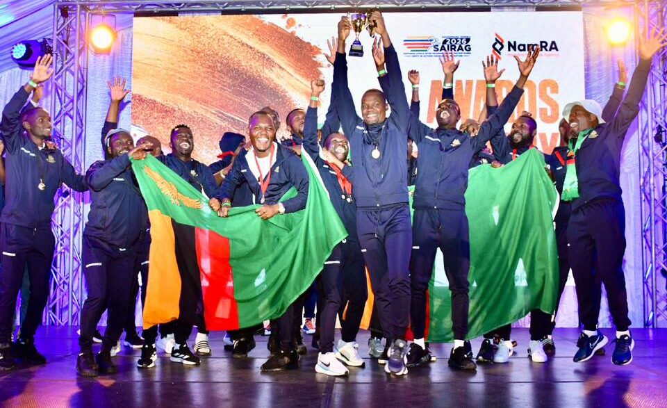 Zambian participants celebrate their overall and football victories at SAIRAG 2026, holding their trophies proudly. Photo by ZRA.