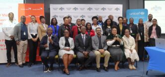 Facilitators from World Vision Eswatini, the Deputy Prime Minister’s Office, and partner organisations pose together in Mbabane after the child participation workshop. Photo by World Vision Eswatini