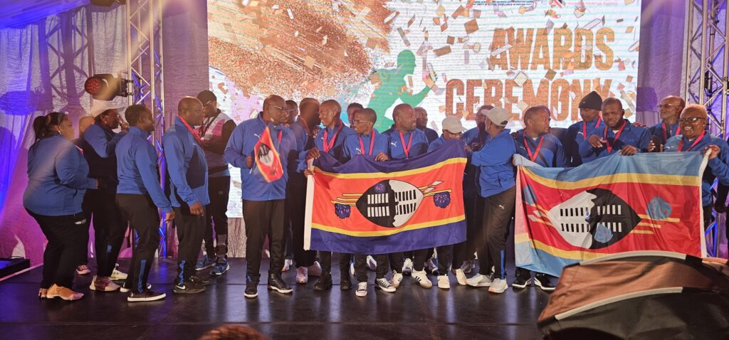 Eswatini Revenue Service athletes celebrate their medal haul in pool, table tennis, netball and chess during the SAIRAG 2026 awards ceremony in Swakopmund, Namibia. Photo by Eswatini Revenue Service.