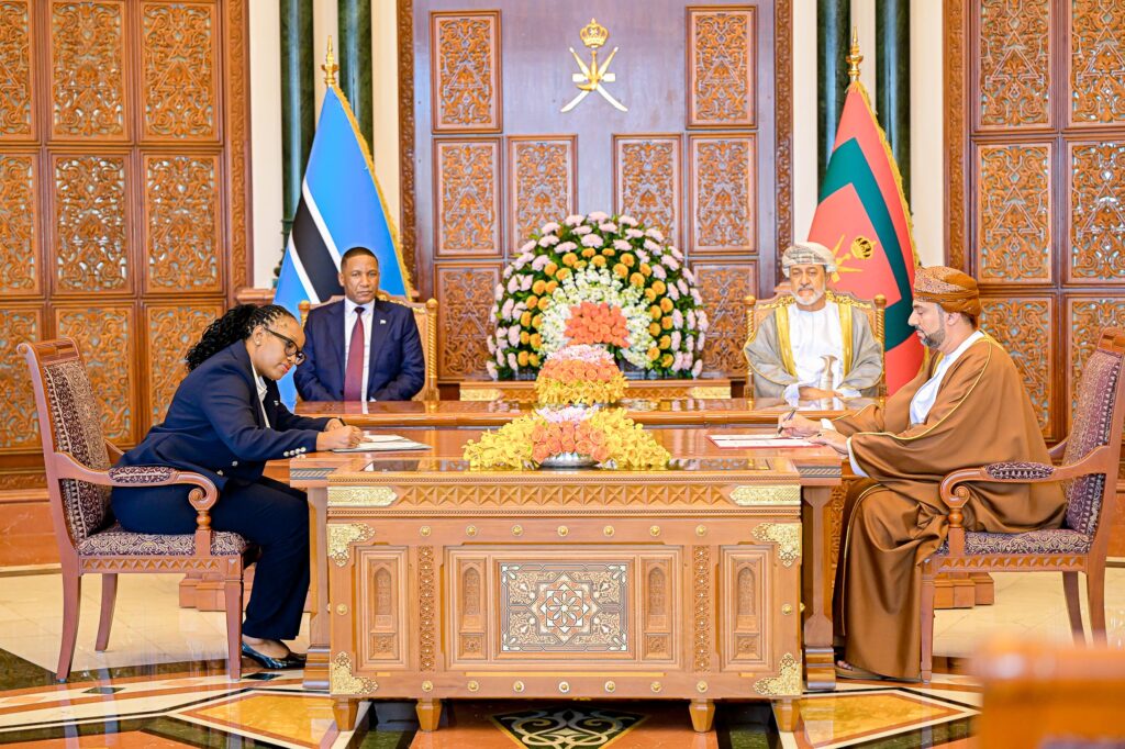 A representative of Botswana and a representative of Oman sign one of the three landmark agreements covering solar energy, minerals exploration and petroleum infrastructure as President Duma Gideon Boko and Sultan Haitham bin Tariq look on during the ceremony held in Oman. Photo: Supplied
