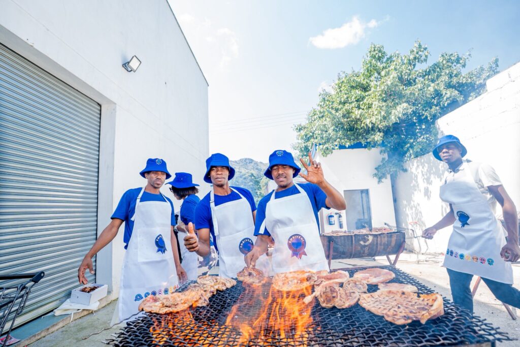 Embiveni Meats staff members stand proudly at the Candana Ja activation at Mbabane Meat Plaza, welcoming shoppers and assisting customers throughout the vibrant community event. Photo by Tribe Studios.