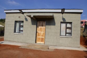 The newly built two-room house valued at E65,000 handed over to 65-year-old Phineas Jonah Dlamini of Nsangwini under Pigg's Peak Inkhundla, complete with solar installation, curtains, a bed and a blanket. Photo: Supplied