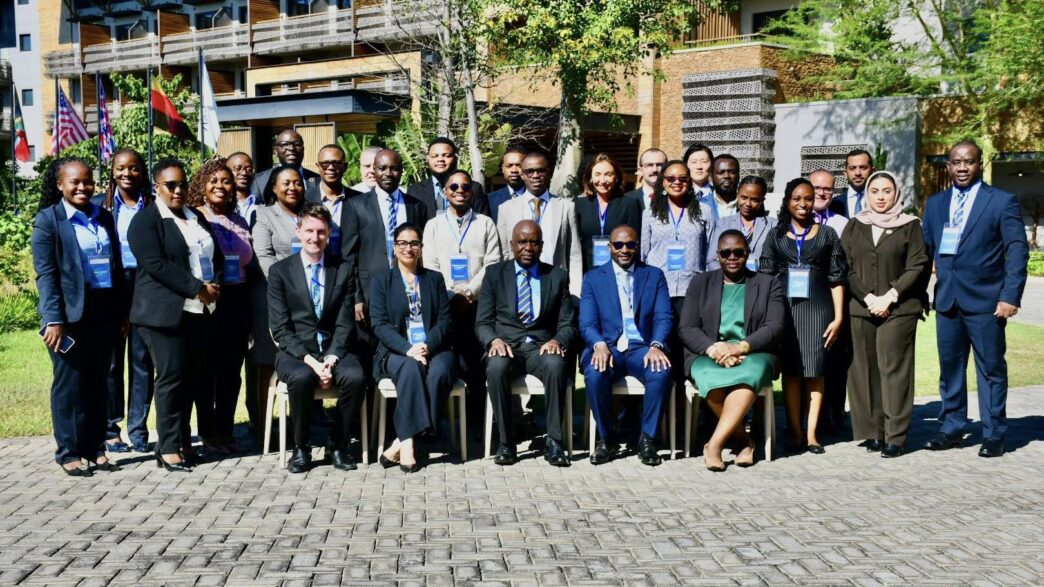 ZRA Commissioner General Dingani Banda, Global Forum Tax Policy Advisor Alex Nuwagira and tax experts from 12 countries pose for a group photo during the opening of the Exchange of Information on Request Assessor Training hosted by the Zambia Revenue Authority in Livingstone. Photo: Supplied
