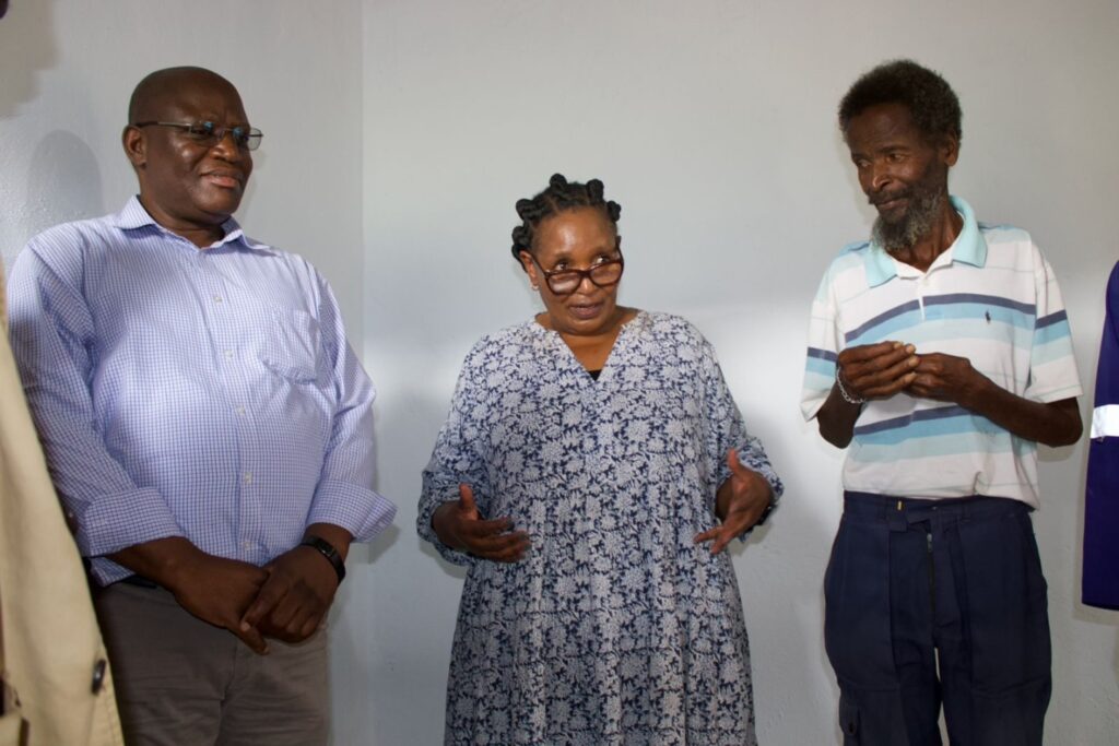 Phineas Jonah Dlamini pictured with Deputy Prime Minister Thulisile Dladla during the handover of his new two-room house at Nsangwini under Pigg's Peak Inkhundla. Photo: Supplied