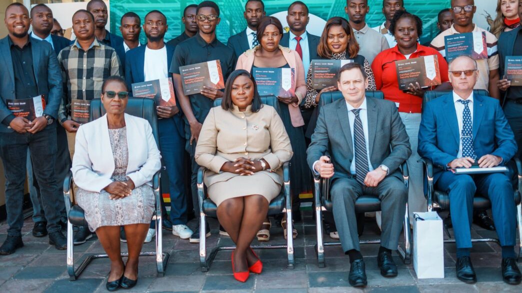 Zimbabwe Minister of ICT, Postal and Courier Services Tatenda Mavetera, Russian Federation Ambassador Nikolai and graduates of the Cyber Security PRO national training programme pose for a group photo during the certificate handover ceremony and the presentation of the National AI Strategy 2026 to 2030. Photo: Supplied