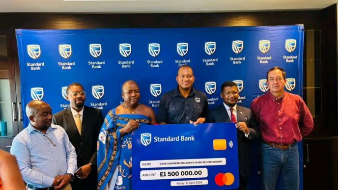 Standard Bank Eswatini Chief Executive Mvuselelo Fakudze (centre) hands over a cheque to representatives of Good Shepherd Hospital,