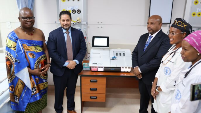 Health Minister Mduduzi Matsebula (left) receives four blood gas analysers from U.S. Chargé d'Affaires Marc Weinstock during a handover ceremony at Raleigh Fitkin Memorial Hospital in Manzini