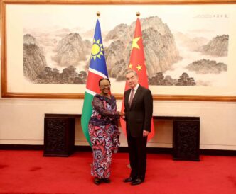 Namibia's Minister of International Relations and Trade Selma Ashipala-Musavyi and Chinese Foreign Minister Wang Yi pictured together during an official visit to Beijing from April 11 to 18, 202