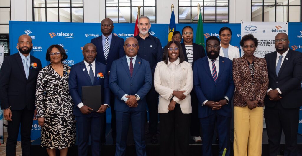 Namibia's Minister of Information and Communication Technology Emma Theofelus, Angola's Minister of Telecommunications Mário Augusto da Silva Oliveira, Angolan Ambassador to Namibia H.E. Pedro Mutindi, Telecom Namibia CEO Dr. Stanley Shanapinda, and Angola Telecom CEO Adilson Miguel dos Santos pictured together following the signing of the MoU in Swakopmund.
