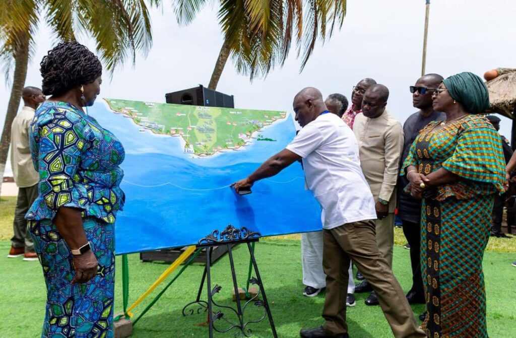 Vice President Jane Naana Opoku-Agyemang and Minister Abla Dzifa Gomashie examine a painted map of the Marine Protected Area project at Greater Cape Three Points during the official launch ceremony. | Photo: Supplied