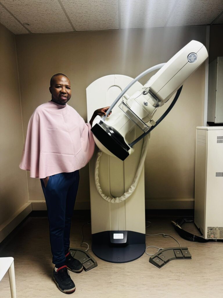 OncAura Wellness Centre director Mandla "Cheeks" Nxumalo, whose personal cancer scare last October became the driving force behind establishing a proper oncology centre in Eswatini, participates in a screening at the facility.