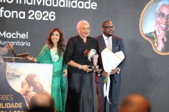 Mozambican social activist and Foundation for Community Development chairperson Graça Machel poses with her Lusophone Personality 2026 prize, awarded by Forbes África Lusófona in Luanda