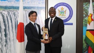 Zimbabwean Foreign Affairs and International Trade Minister Professor Amon Murwira pictured with outgoing JICA Zimbabwe Resident Representative Shigeki Furuta during a farewell courtesy call at the Munhumutapa Offices in Harare on Monday.