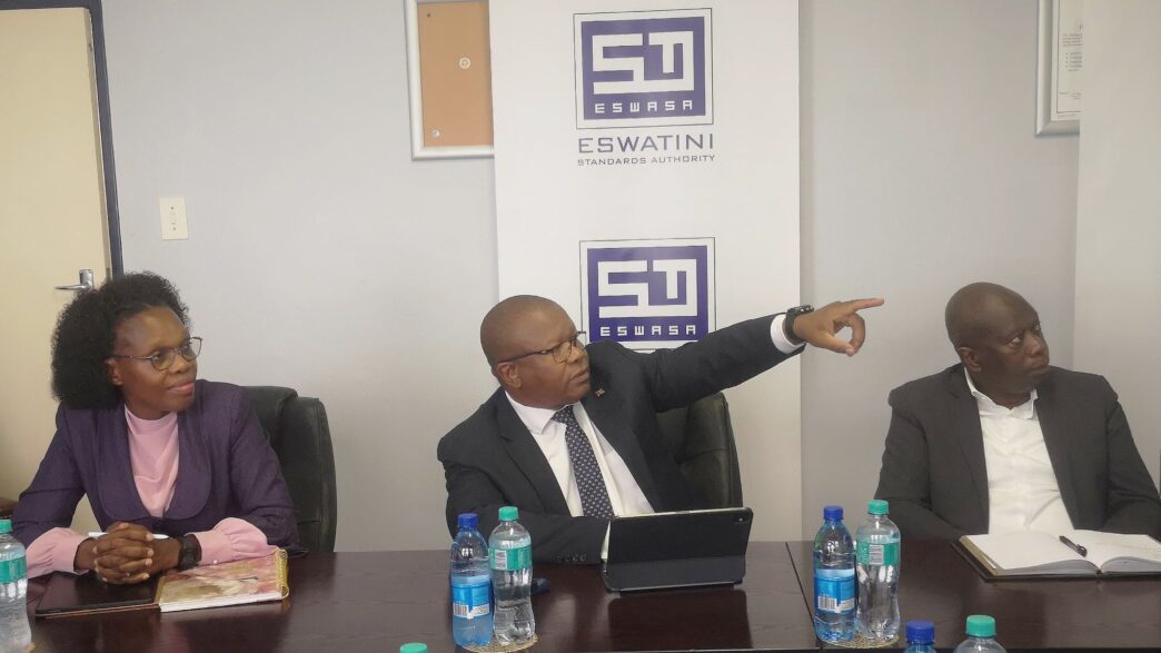 Minister of Commerce, Industry and Trade Manqoba Khumalo listens to the Eswatini Standards Authority's 2024 to 2025 progress report at the ESWASA offices