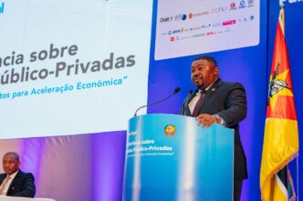 Mozambique's Minister of Economy Basílio Muhate addresses delegates at the second Public-Private Partnerships conference in Maputo, where he acknowledged serious challenges facing the development of PPPs in the country.
