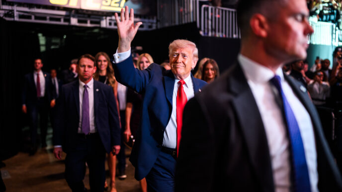 President Donald J. Trump arrives at UFC 327 and greets supporters during the high profile mixed martial arts event.