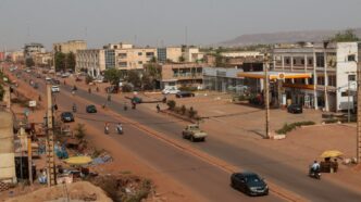 People move on a street after insurgents launched attacks on military bases across the country, in Bamako, Mali April 25, 2026. REUTERS/Aboubacar Traore